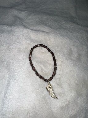 Vintage brown and silver beaded angel wing pendant bracelet